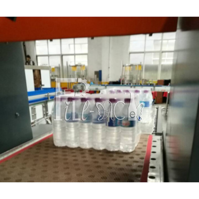 La L automatica il tipo bottiglia di vetro dell'ANIMALE DOMESTICO della bevanda dell'acqua dell'involucro del film di strizzacervelli del PE può attrezzatura